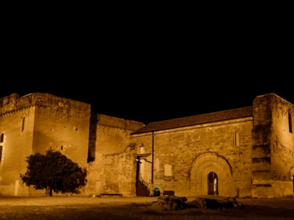 Castell de Gardeny, façade of the castle at night, with a lot of lighting.